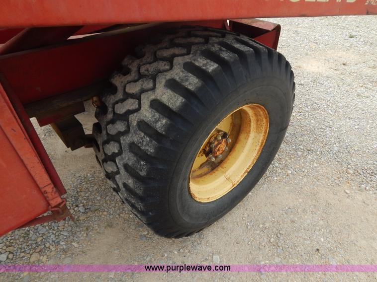 image for item G3204 New Holland Super 1048 stack cruiser