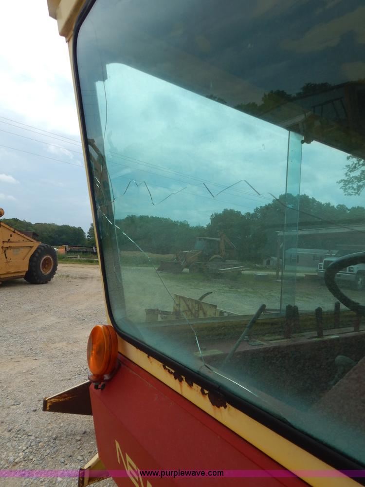 image for item G3204 New Holland Super 1048 stack cruiser