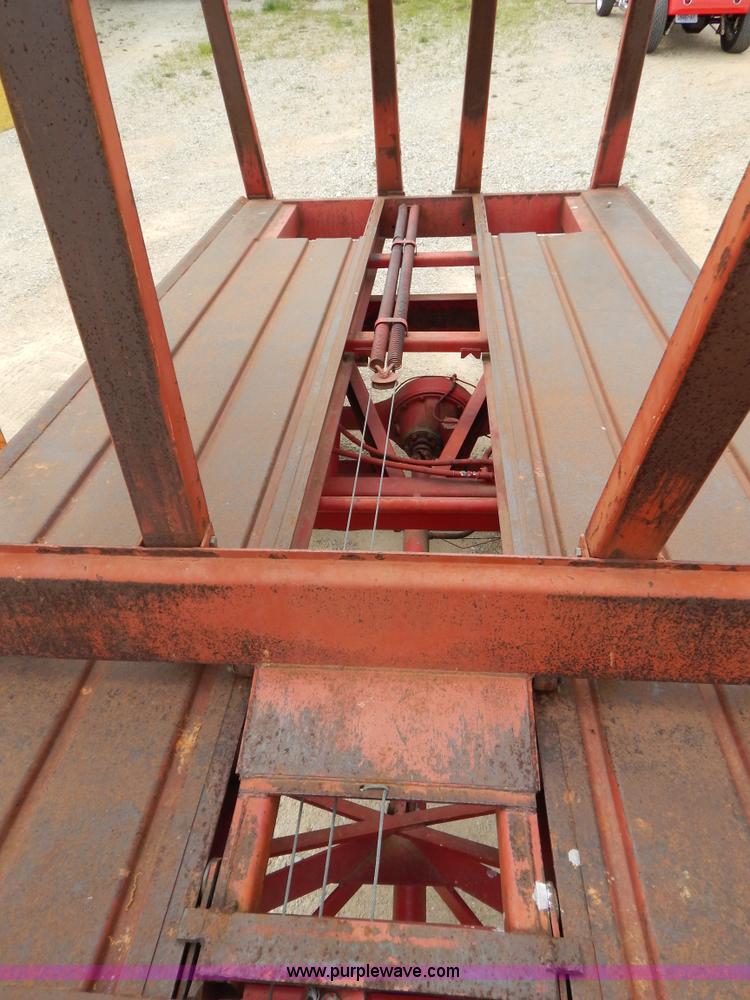 image for item G3204 New Holland Super 1048 stack cruiser