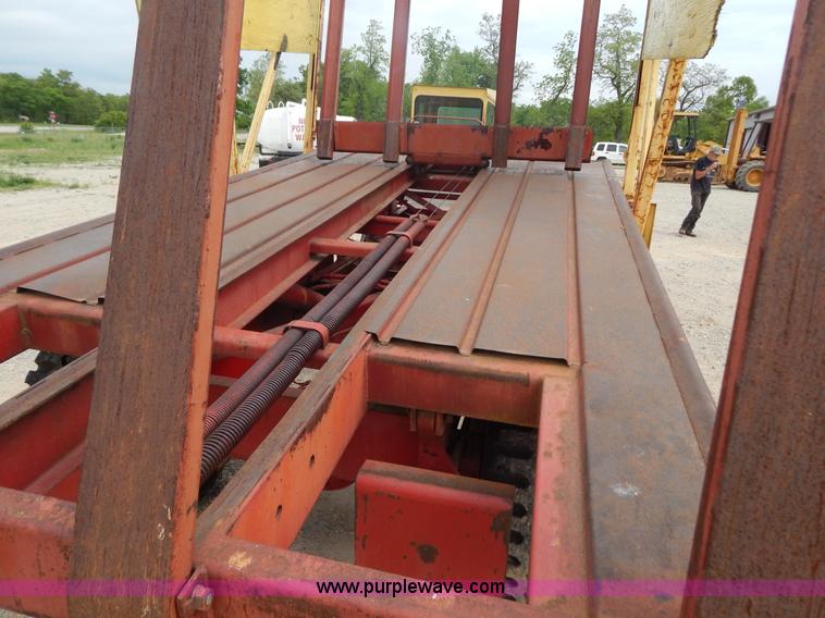 image for item G3204 New Holland Super 1048 stack cruiser