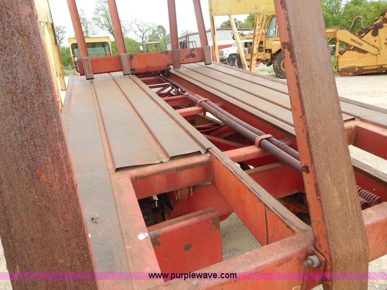 image for item G3204 New Holland Super 1048 stack cruiser