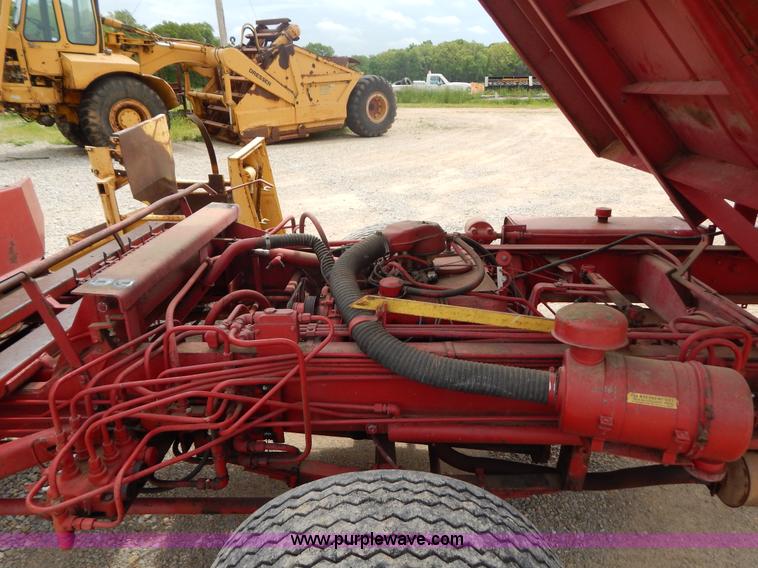 image for item G3204 New Holland Super 1048 stack cruiser