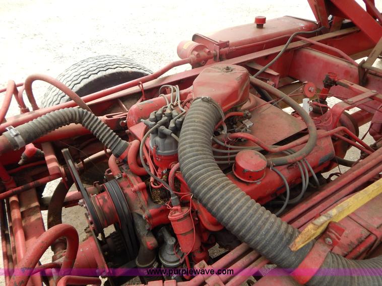 image for item G3204 New Holland Super 1048 stack cruiser