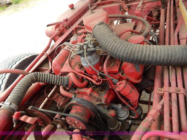 image for item G3204 New Holland Super 1048 stack cruiser