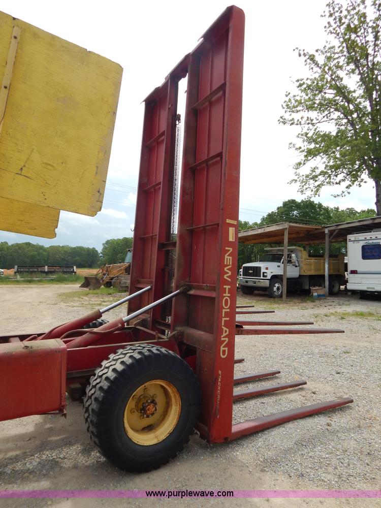 image for item G3204 New Holland Super 1048 stack cruiser