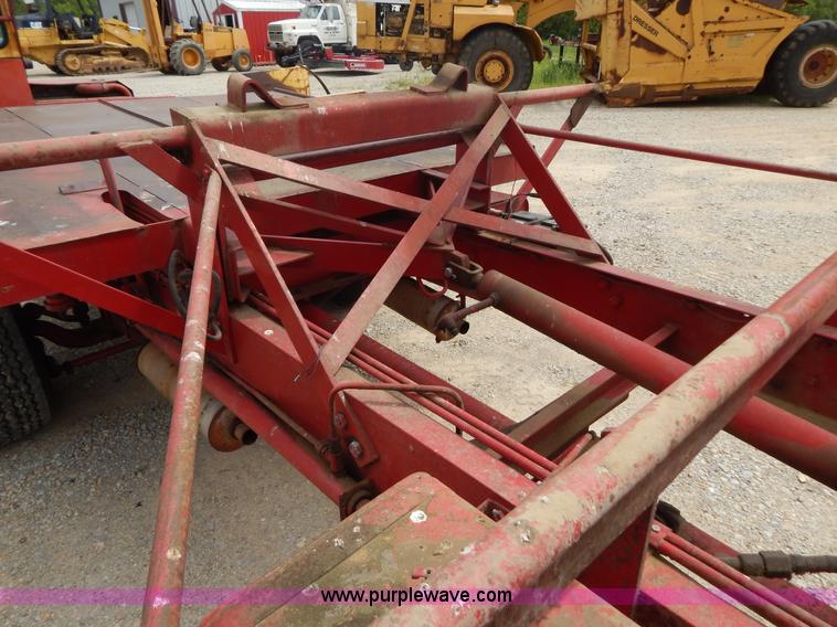 image for item G3204 New Holland Super 1048 stack cruiser