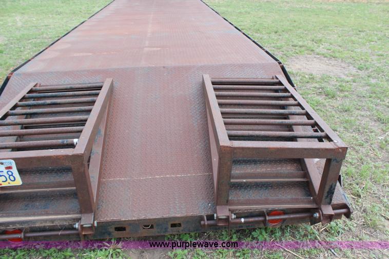 image for item G5481 1983 Bohn double axle flatbed gooseneck trailer