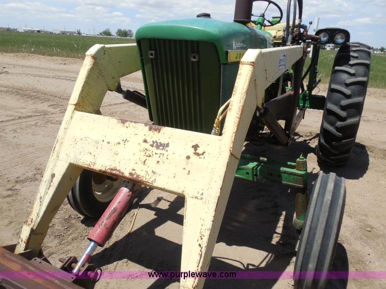 image for item H3156 1962 John Deere 2010 tractor