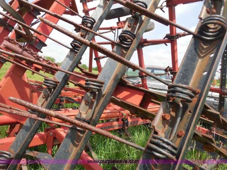 image for item H3164 Case 4800 field cultivator with vibra shanks
