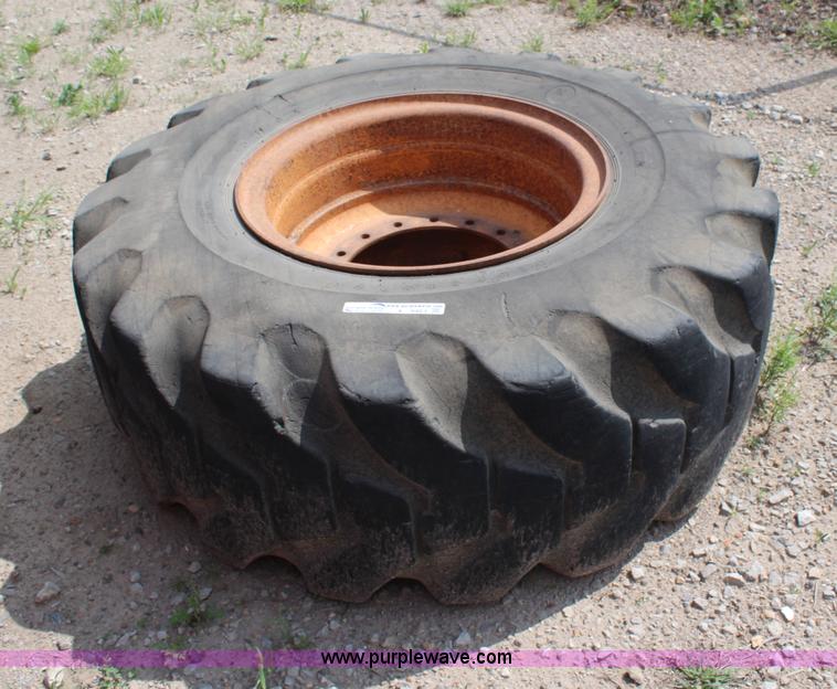 image for item X9463 Firestone 20.5-25 used tire and wheels