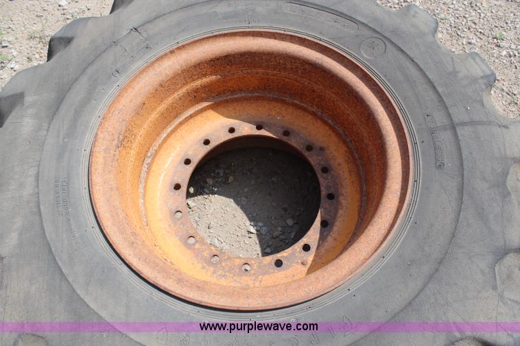 image for item X9463 Firestone 20.5-25 used tire and wheels
