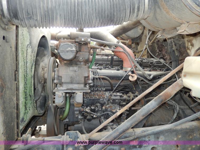 image for item D4790 1988 International F2554 barrel dump truck