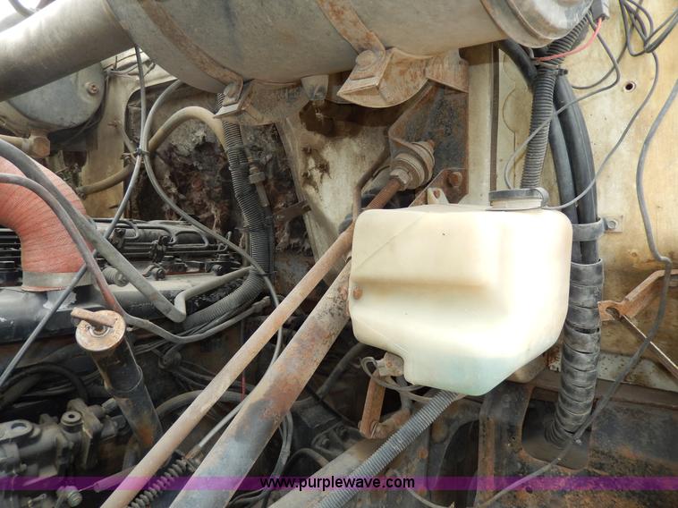 image for item D4790 1988 International F2554 barrel dump truck