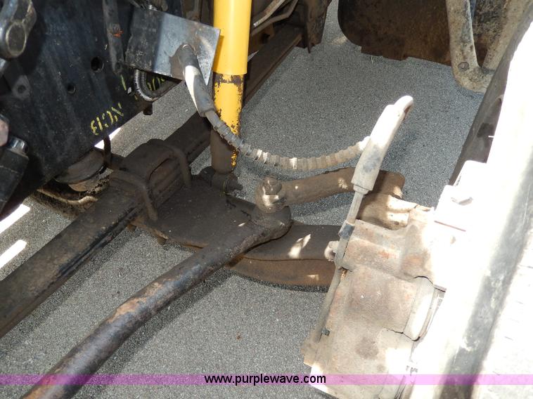 image for item D8074 1994 Ford F700 flatbed truck