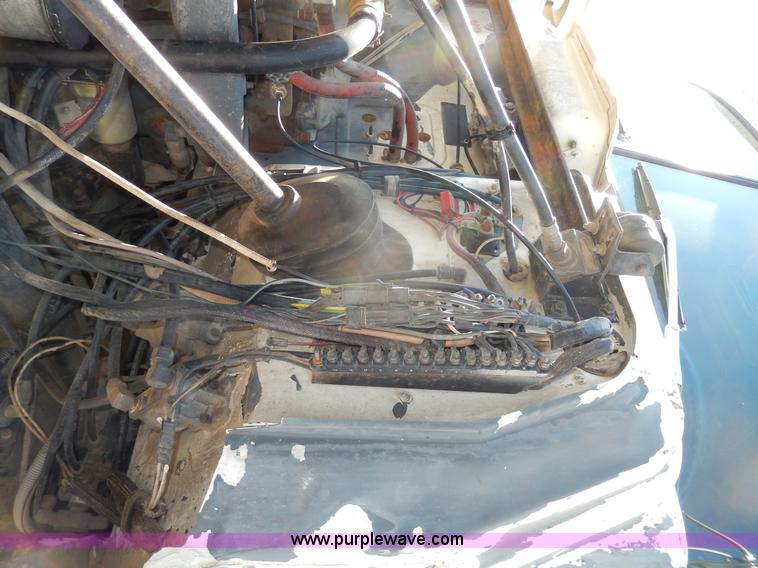 image for item D8169 1986 Mack RS686LS barrel dump truck