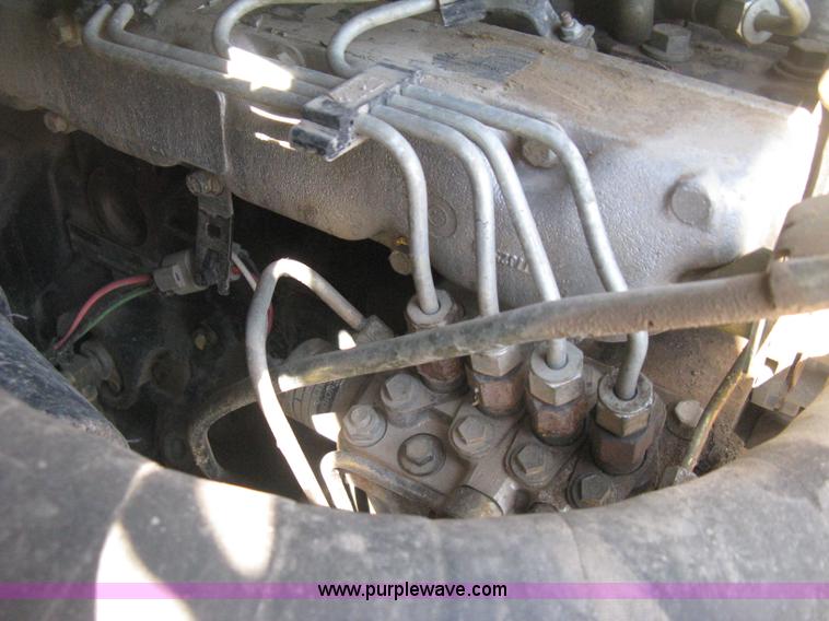 image for item E3435 2002 Caterpillar 257 skid steer