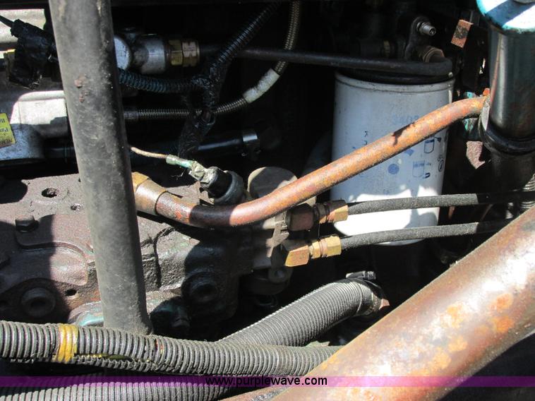 image for item E7242 1999 International 4900 dump truck