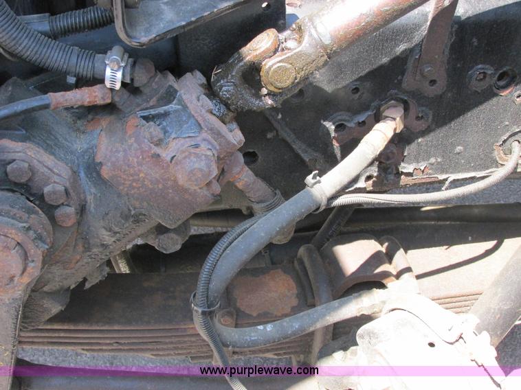 image for item E7242 1999 International 4900 dump truck