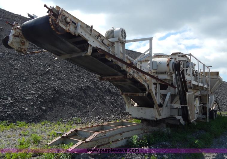 image for item G3197 Cedarapids portable roller bearing jaw rock crusher