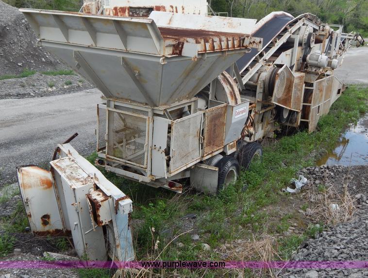 image for item G3197 Cedarapids portable roller bearing jaw rock crusher