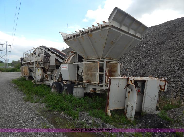 image for item G3197 Cedarapids portable roller bearing jaw rock crusher