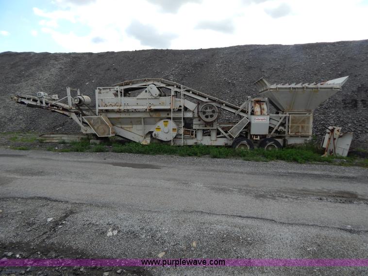 image for item G3197 Cedarapids portable roller bearing jaw rock crusher