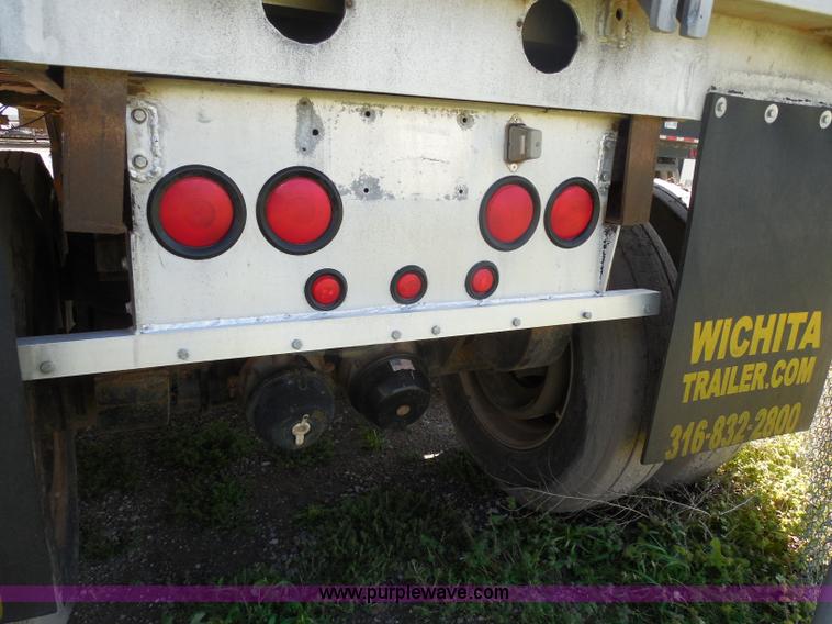 image for item H3216 1994 Travis end dump trailer
