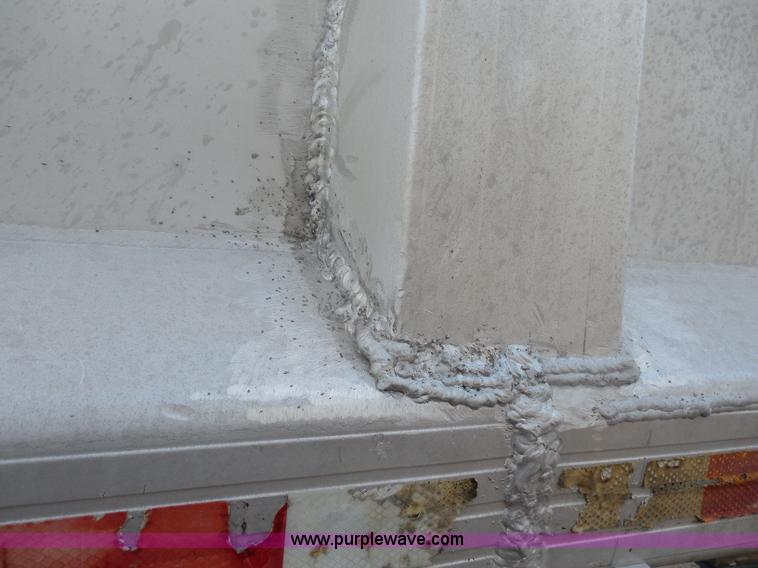 image for item H3216 1994 Travis end dump trailer