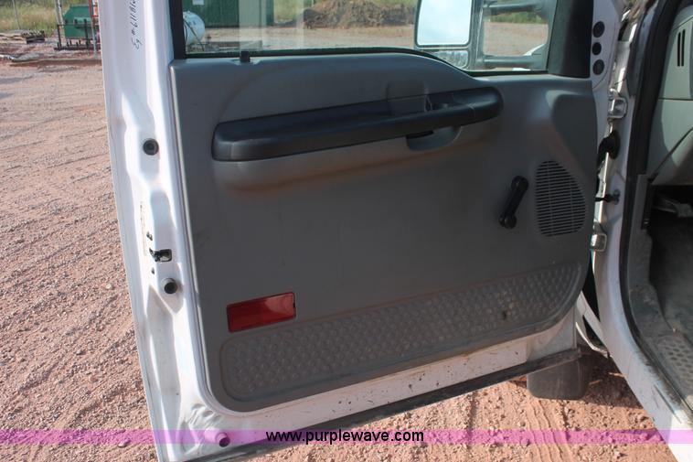 image for item H3503 2006 Ford F450 XL Super Duty stake bed truck