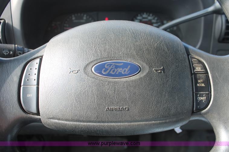 image for item H3503 2006 Ford F450 XL Super Duty stake bed truck