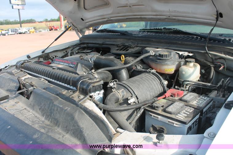 image for item H3503 2006 Ford F450 XL Super Duty stake bed truck