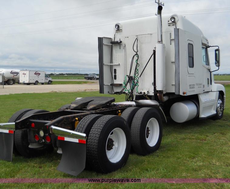 image for item C1129 2004 Freightliner ST120 semi truck