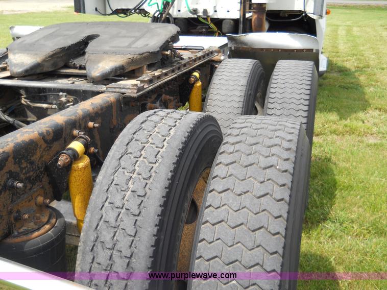 image for item C1129 2004 Freightliner ST120 semi truck