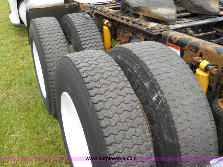 image for item C1129 2004 Freightliner ST120 semi truck