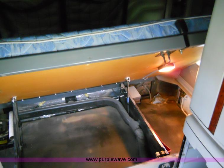 image for item C1129 2004 Freightliner ST120 semi truck