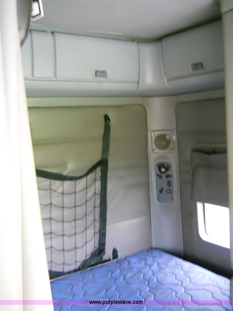 image for item C1129 2004 Freightliner ST120 semi truck