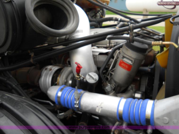 image for item C1129 2004 Freightliner ST120 semi truck