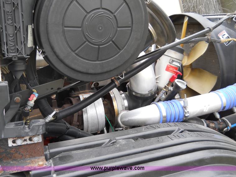 image for item C1129 2004 Freightliner ST120 semi truck