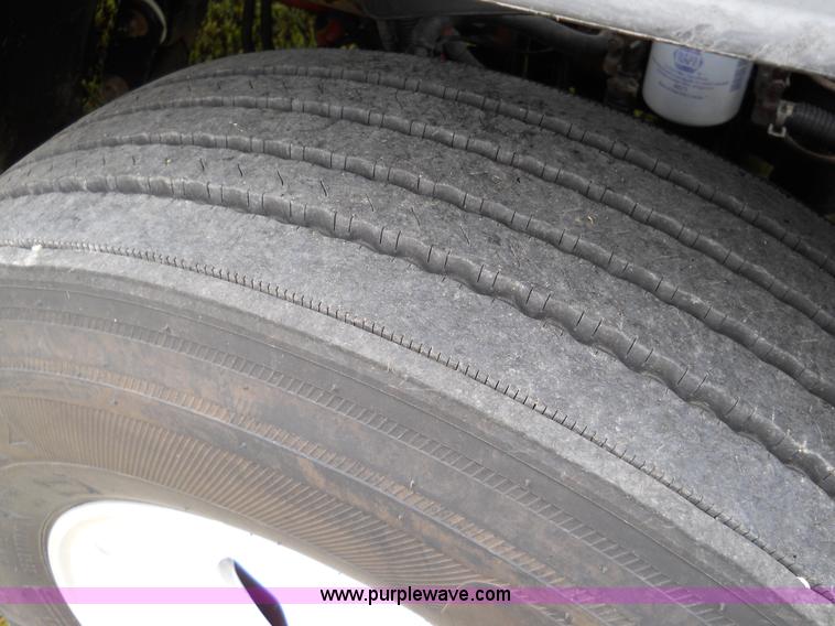 image for item C1129 2004 Freightliner ST120 semi truck