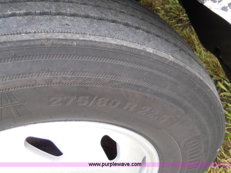 image for item C1129 2004 Freightliner ST120 semi truck