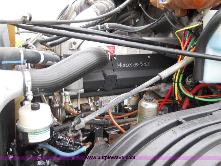 image for item C1129 2004 Freightliner ST120 semi truck