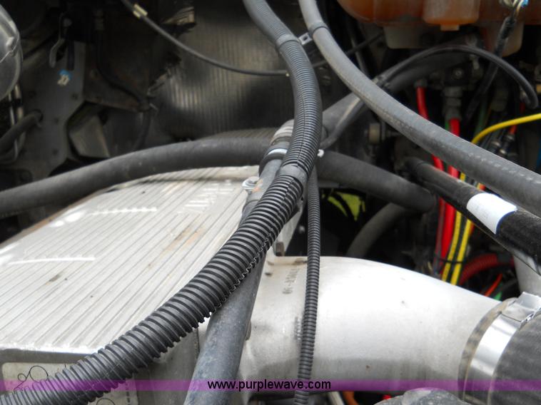 image for item C1129 2004 Freightliner ST120 semi truck