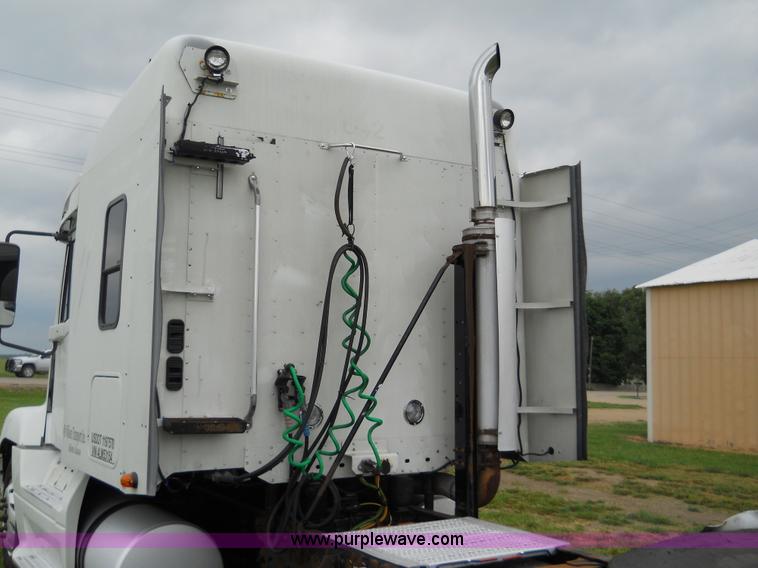 image for item C1129 2004 Freightliner ST120 semi truck