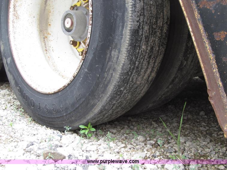 image for item D7370 1991 Trail King TK100HDG-493 triple axle lowboy trailer