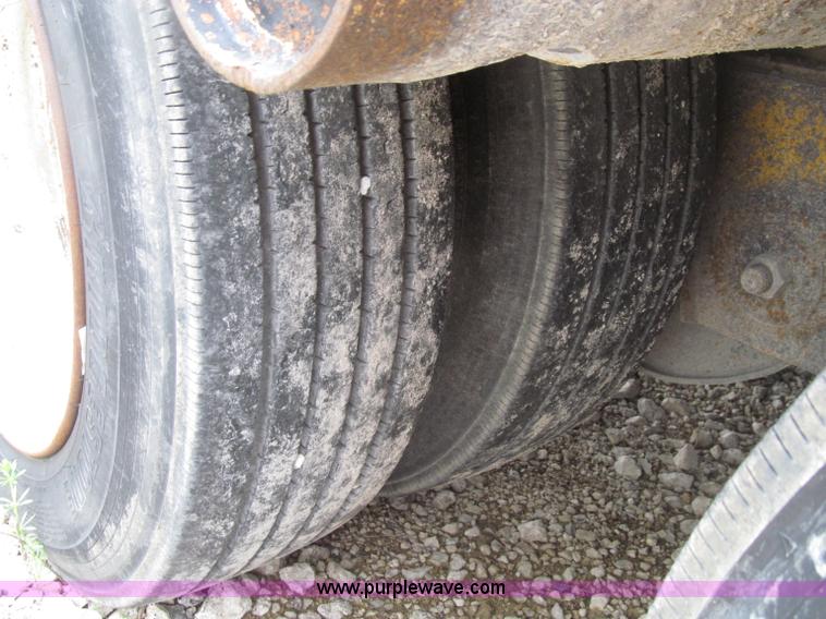 image for item D7370 1991 Trail King TK100HDG-493 triple axle lowboy trailer