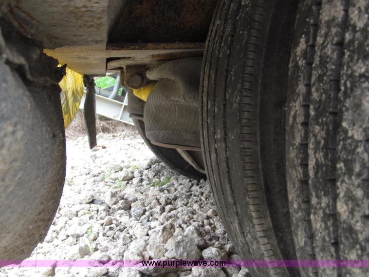 image for item D7370 1991 Trail King TK100HDG-493 triple axle lowboy trailer