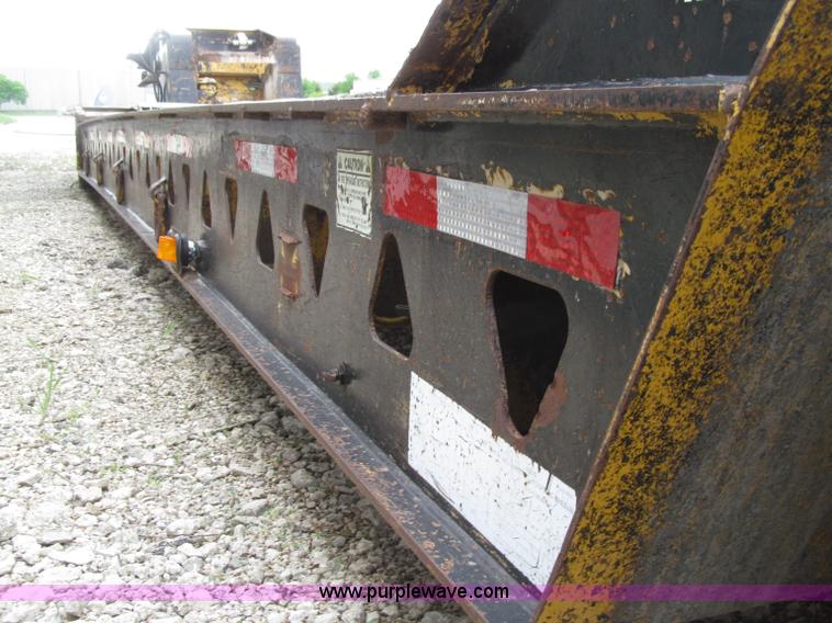 image for item D7370 1991 Trail King TK100HDG-493 triple axle lowboy trailer