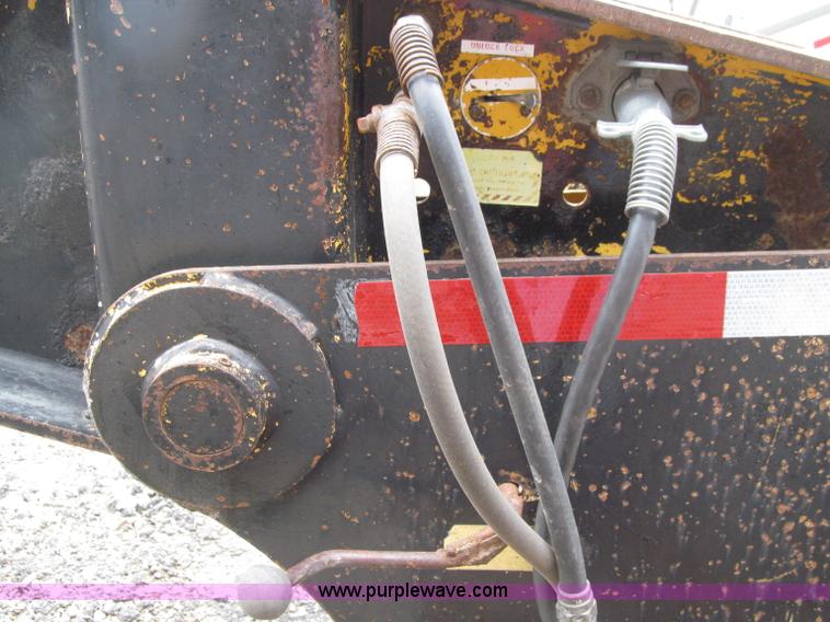 image for item D7370 1991 Trail King TK100HDG-493 triple axle lowboy trailer