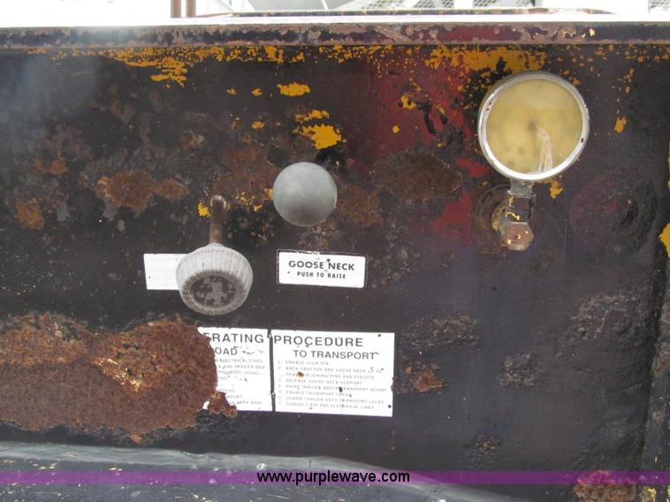 image for item D7370 1991 Trail King TK100HDG-493 triple axle lowboy trailer