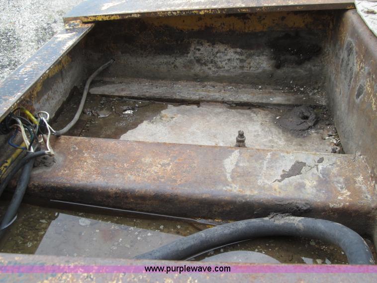 image for item D7370 1991 Trail King TK100HDG-493 triple axle lowboy trailer